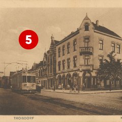 5. Türchen: Ecke Kölner Straße - Wilhelmstraße auf einer historischen Ansichtskarte, Verlag Ferdinand Becker (Quelle: Stadtarchiv Troisdorf)